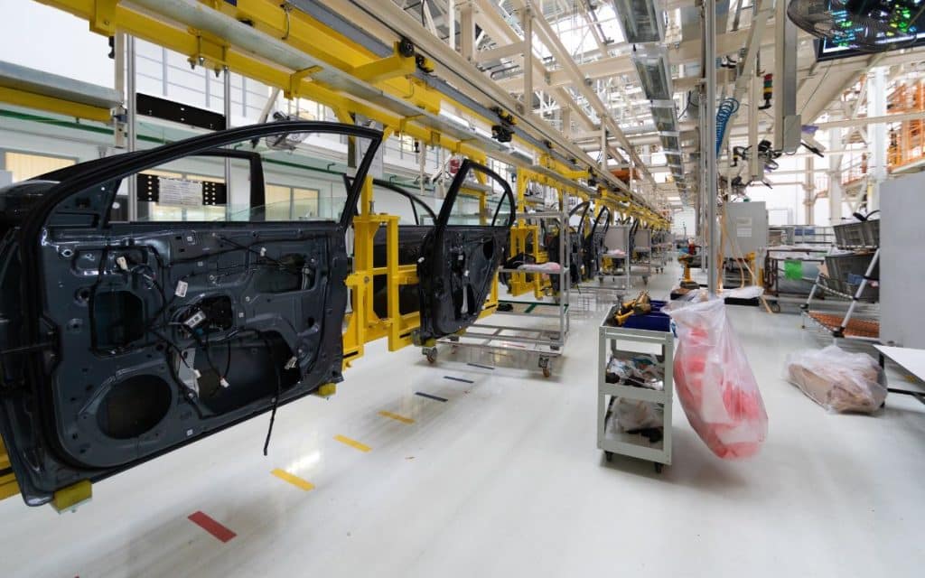 Imagen de una fábrica de automóviles, en referencia a la producción de la compañía Ford Motor Company.