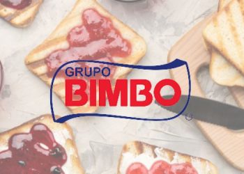 Vemos una imagen del logo de la empresa Bimbo con una imagen detrás de unas tostadas de su pan de molde característico.