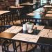 Vemos una imagen de unas mesas de restaurante, en referencia a la elaboración de un estudio de mercado de un restaurante.