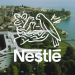 Vemos una imagen de la sede central de Nestlé, en relación con su misión y visión.